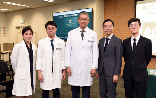 Dr Michael Co Tiong-hong (middle) and Dr John Yuen Tsz-hon (second right) along with their students, showcasing the novel 'AI virtual patients' diagnostic application which breaks spatial and geographical barriers.
 